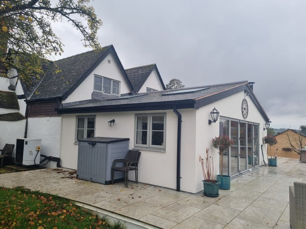 This project included the installation of a sleek and stylish Smarts Visofold 1000 Slimline bifold door, which opens up the home to incredible views of the surrounding countryside.