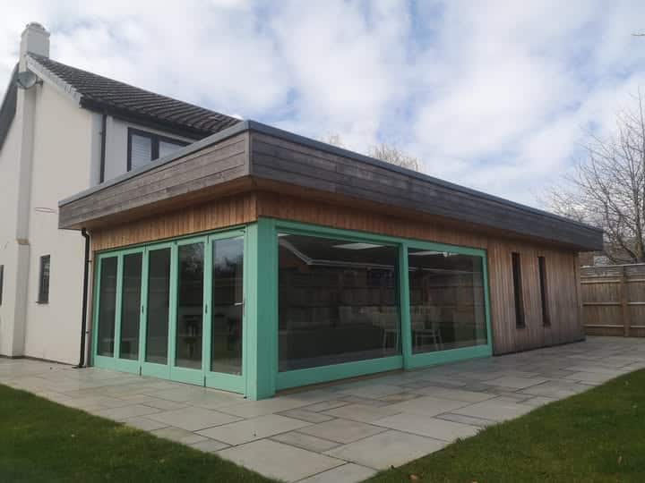 Recently, we had the pleasure of working on a stunning set of bespoke green patio sliding doors in Cheltenham.