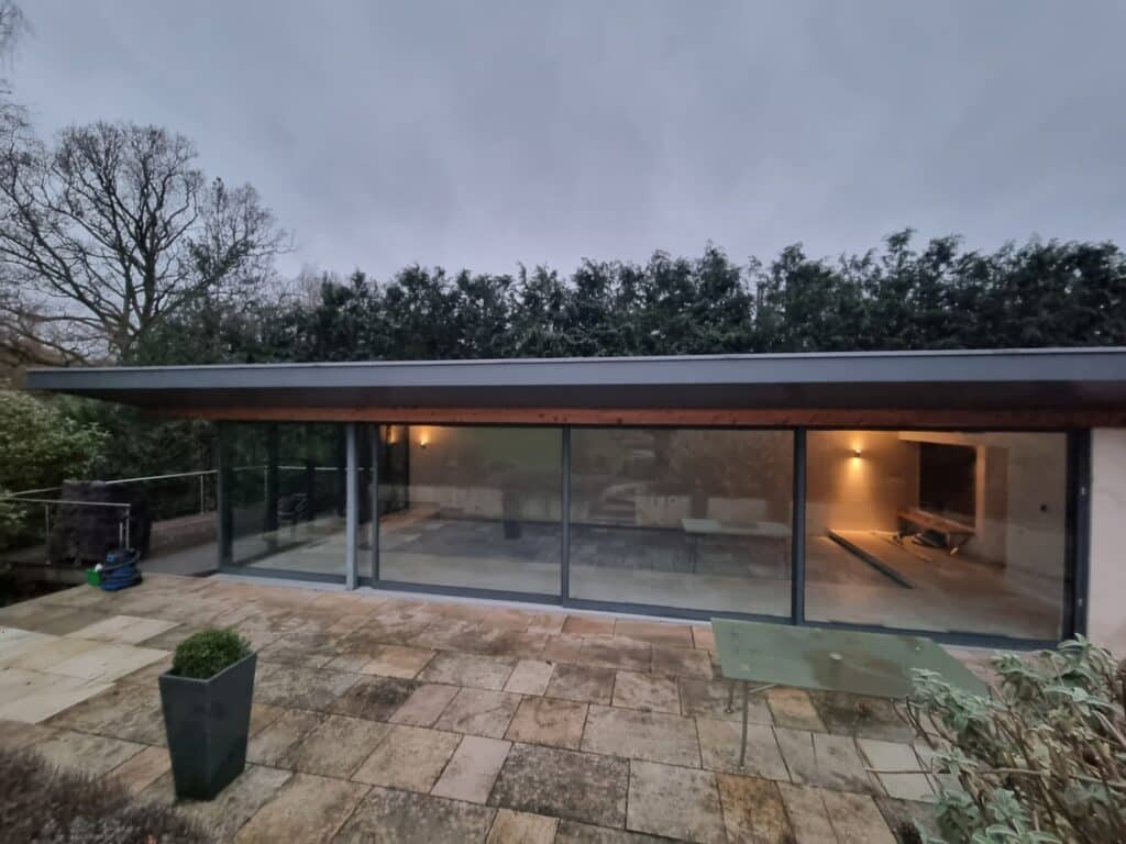 Recently, we tackled a project in Oxford, where the impressive sliding doors to a pool house had developed operational issues due to a dropped head, resulting in jamming and difficult use.