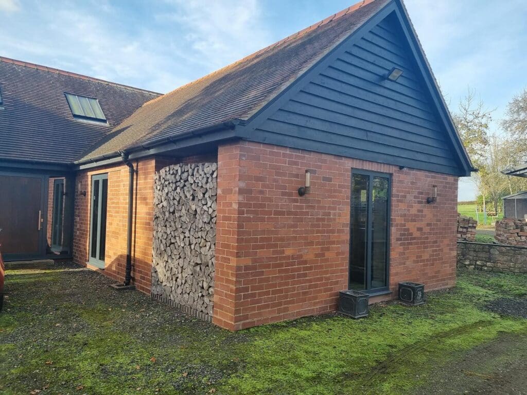 Our recent project in a breathtaking barn conversion in Herefordshire is a perfect example. This standout installation highlights the beauty and performance of Schüco aluminium systems, transforming the space into a masterpiece of style and functionality.